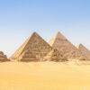 Majestic Great Pyramids of Cheops in Egypt, showcasing ancient architecture.