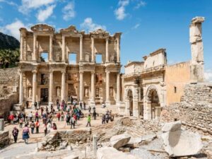 Ruins of Ephesus Ancient City, showcasing iconic pillars and stone streets.