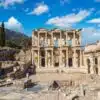 Ephesus Ancient City Ruins with well-preserved columns, pathways, and historical structures under a clear sky.