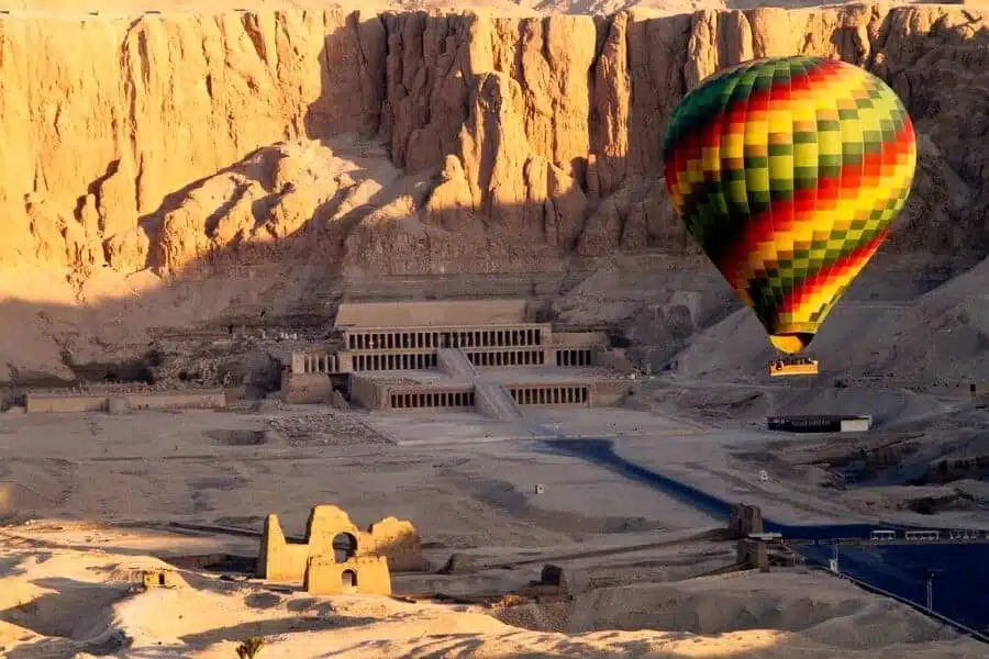 Luxor's Valley of the Queens and Cemetery with ornate tombs set against a desert backdrop.