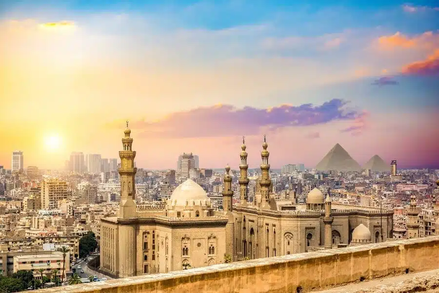 Panoramic view of Islamic Cairo, featuring historic mosques, bustling markets, and traditional Islamic architecture.