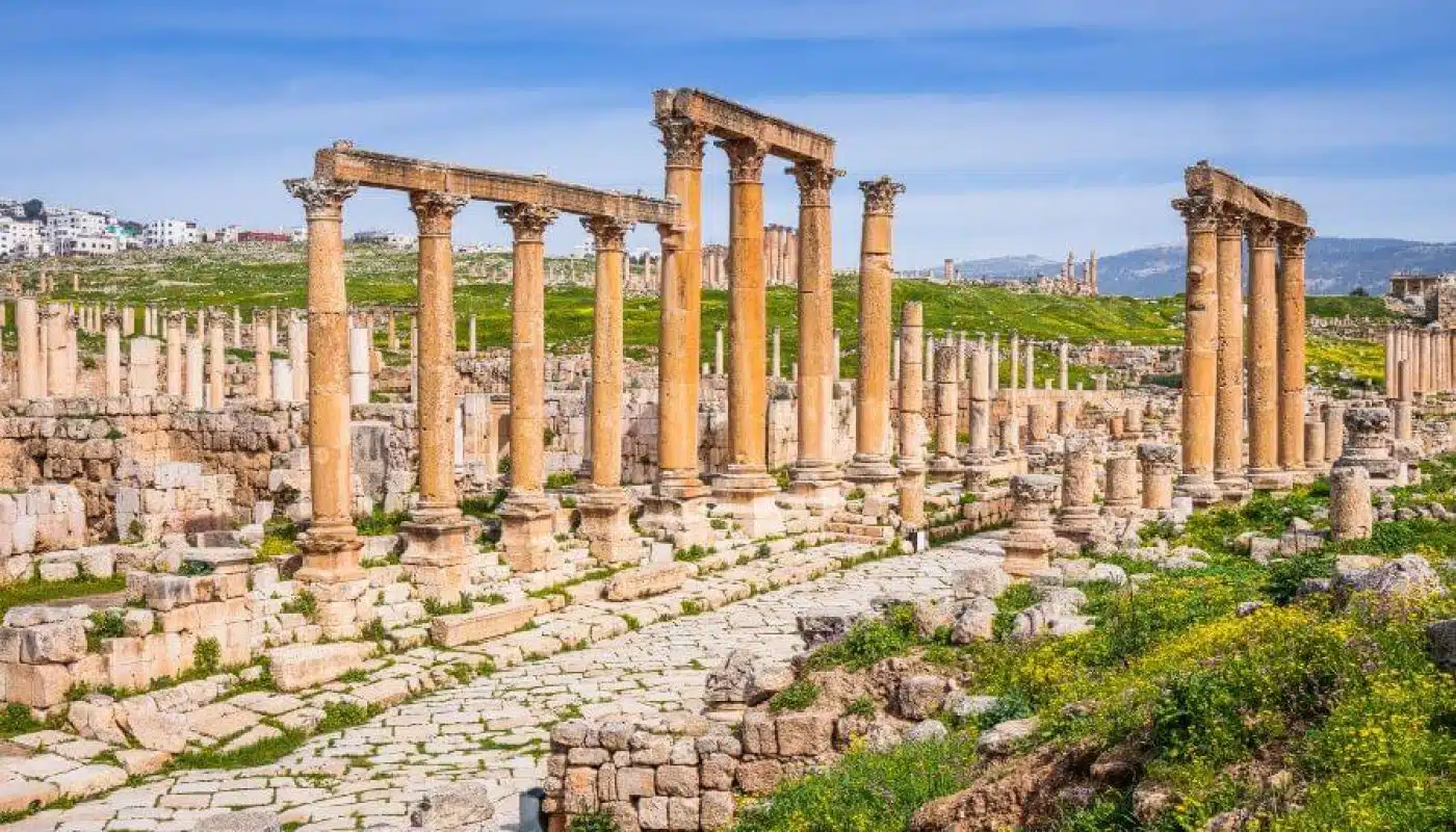 Exploring the ancient ruins of Jerash, Jordan with columns and arches