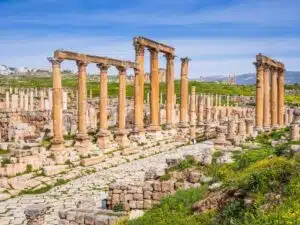 Exploring the ancient ruins of Jerash, Jordan with columns and arches