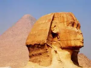 Miniature replica of the Pyramid of Chephren, showcasing its distinct limestone casing and historical significance.