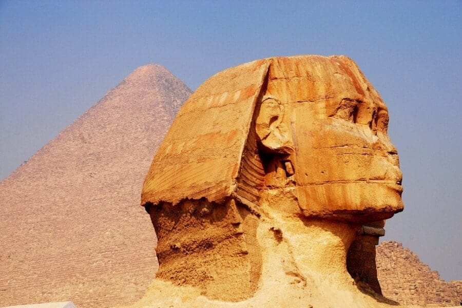 Miniature replica of the Pyramid of Chephren, showcasing its distinct limestone casing and historical significance.