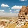 View of Uchisar Castle in Cappadocia, showcasing its unique rock formations and towers.