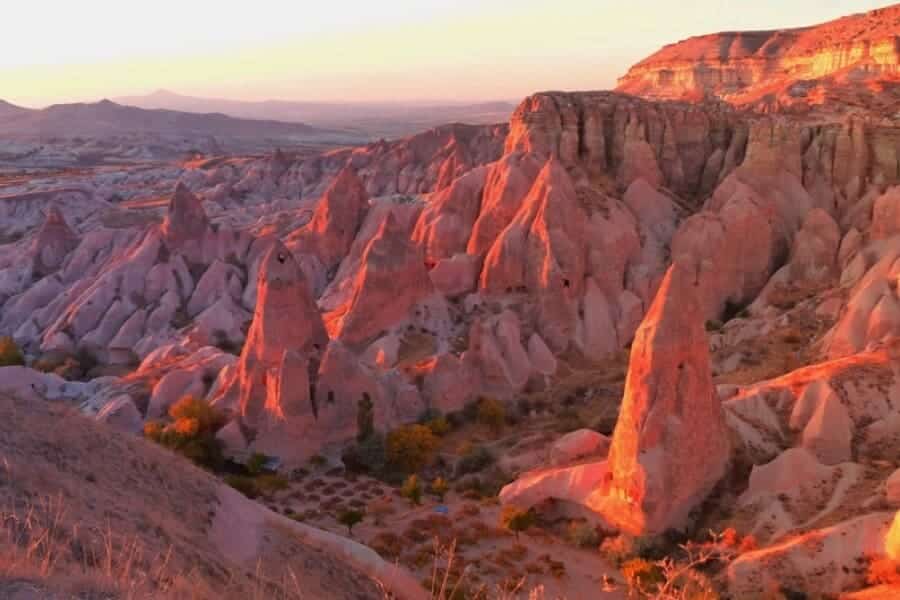 Stunning view of Rose Valley in Cappadocia, showcasing vibrant hues and unique rock formations.