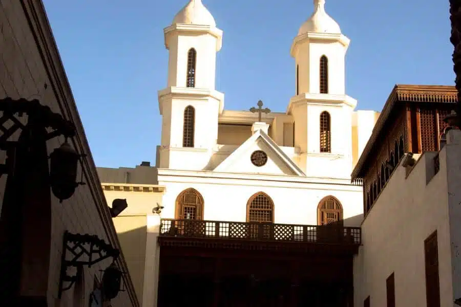 Exterior view of the Hanging Church in Cairo, showcasing its distinct architectural style and historical significance."