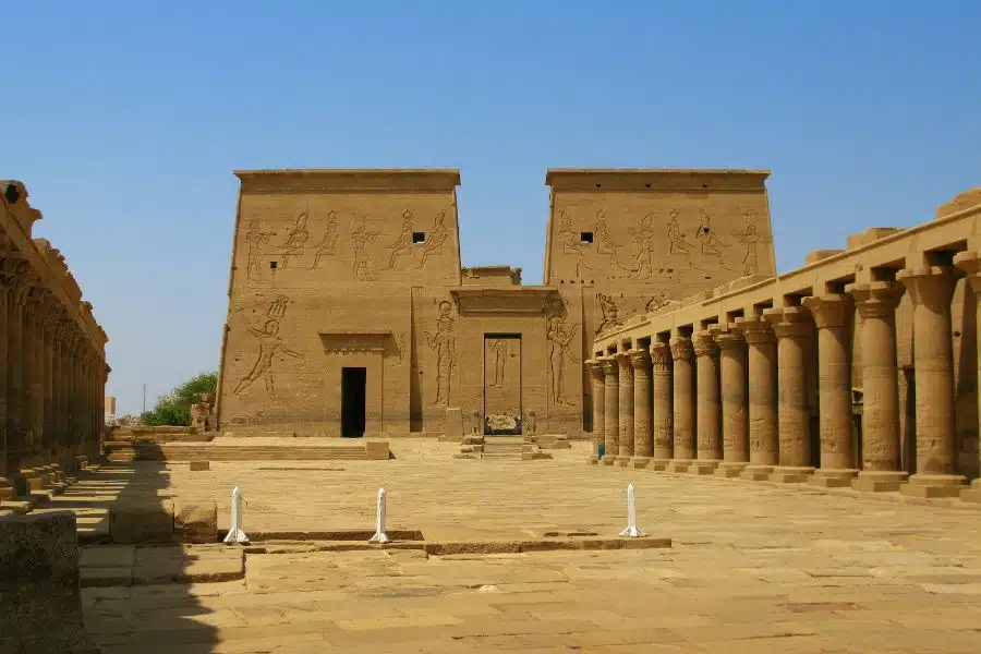 Philae Temple in Aswan, stunning riverside ancient Egyptian complex with intricate hieroglyphics.