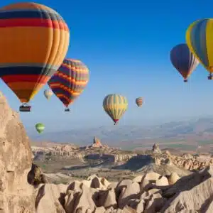 Scenic hot air balloon ride over the unique rock formations of Cappadocia, Turkey.