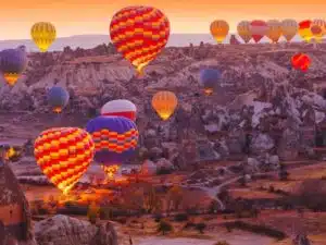 Balloon flight over the unique rock formations of Cappadocia, with a view of the Goreme National Park, starting from Istanbul.