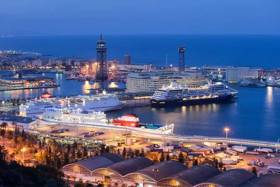 a large ship docked at a port in Kusadasi