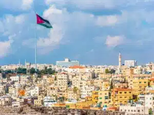 The Ultimate Amman City Guide Cover of 'The Ultimate Amman City Guide' showcasing Amman's cityscape, including key landmarks and cultural highlights.