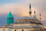 Alaeddin Mosque in Konya, a historic structure with distinctive Seljuk architecture, featuring a large courtyard and intricate stonework.