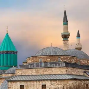 Alaeddin Mosque in Konya, a historic structure with distinctive Seljuk architecture, featuring a large courtyard and intricate stonework.
