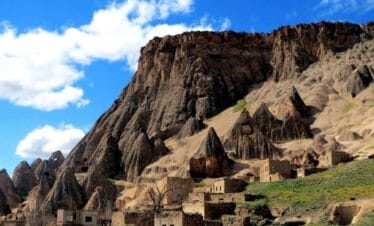 Selime Monastery and surrounding fairy chimneys carved into volcanic rock in Cappadocia, Turkey.
