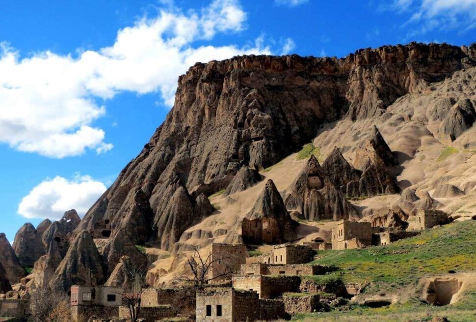 Selime Monastery and surrounding fairy chimneys carved into volcanic rock in Cappadocia, Turkey.