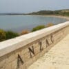 ANZAC Cove memorial wall overlooking the serene coastline of Gallipoli Peninsula in Çanakkale, Turkey.