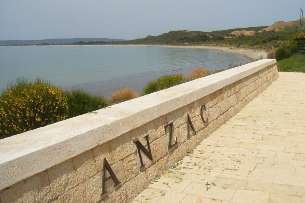 ANZAC Cove memorial wall overlooking the serene coastline of Gallipoli Peninsula in Çanakkale, Turkey.