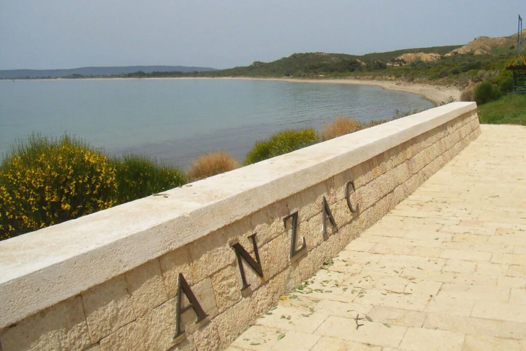 ANZAC Cove memorial wall overlooking the serene coastline of Gallipoli Peninsula in Çanakkale, Turkey.