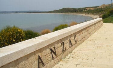 ANZAC Cove memorial wall overlooking the serene coastline of Gallipoli Peninsula in Çanakkale, Turkey.