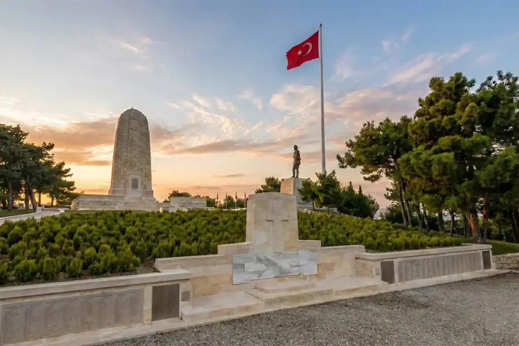 Sunset view of the Australian Memorial and Turkish flag at Gallipoli on a day tour from Istanbul.