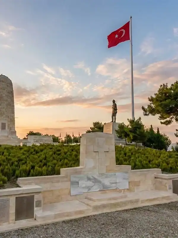 Sunset view of the Australian Memorial and Turkish flag at Gallipoli on a day tour from Istanbul.