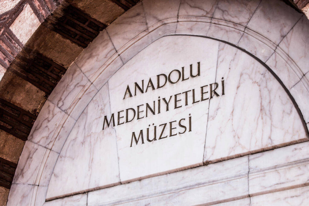 Marble arch inscribed with “Anadolu Medeniyetleri Müzesi,” marking the entrance to the Anatolian Civilizations Museum in Ankara.