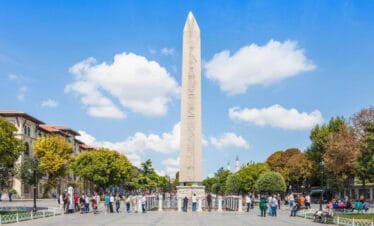 Ancient Egyptian Obelisk of Theodosius with hieroglyphs standing tall in Sultanahmet Square, Istanbul, Turkey.
