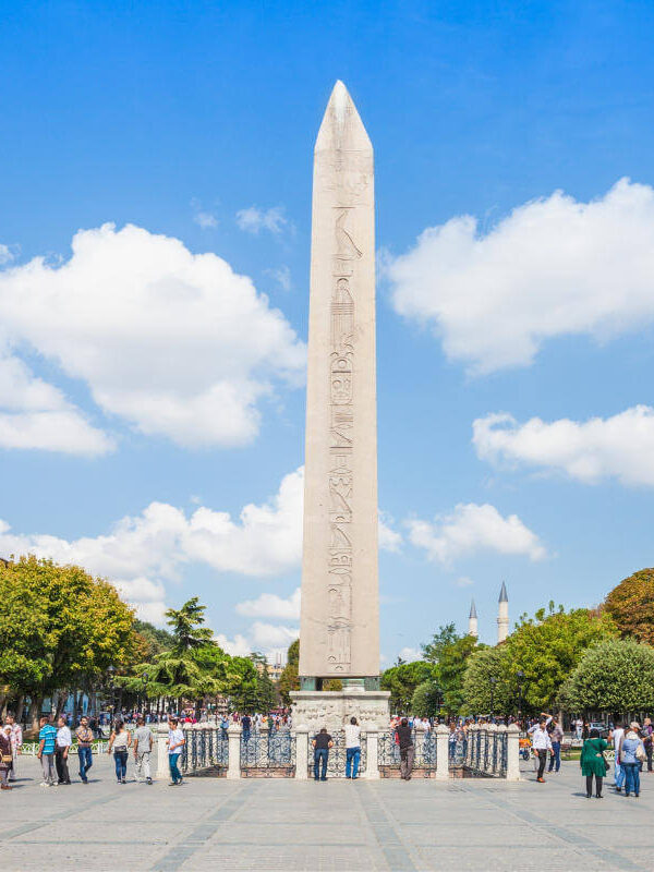 Ancient Egyptian Obelisk of Theodosius with hieroglyphs standing tall in Sultanahmet Square, Istanbul, Turkey.