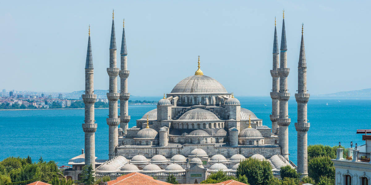 Iconic Blue Mosque with six slender minarets and cascading domes near the Bosphorus in Istanbul, Turkey.