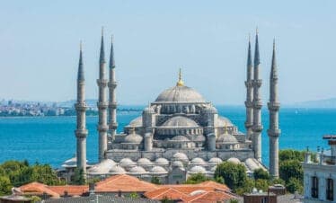 Iconic Blue Mosque with six slender minarets and cascading domes near the Bosphorus in Istanbul, Turkey.