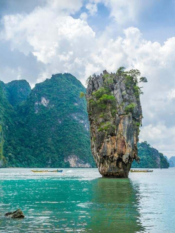 Iconic limestone karst of James Bond Island rising from turquoise waters in Phang Nga Bay, Thailand.