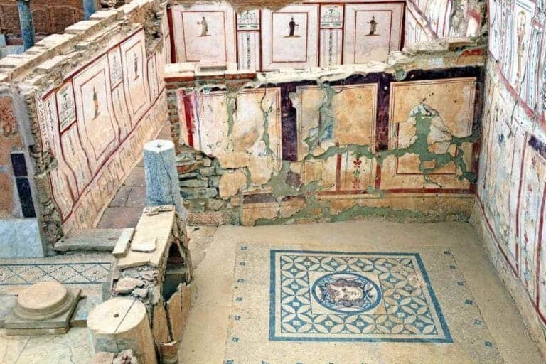 Ancient frescoed walls and mosaic floors inside Ephesus Terrace Houses, showcasing Roman-era art and architecture.
