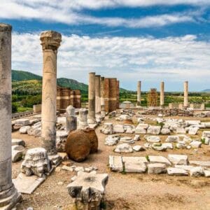 Ancient ruins of stone columns and scattered marble remains at the Basilica of St. John in Selçuk, Turkey.