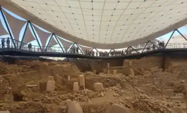 Aerial view of the ancient T-shaped pillars at the Gobeklitepe archaeological site, the world's oldest temple, featured on a premium guided day tour from Istanbul.